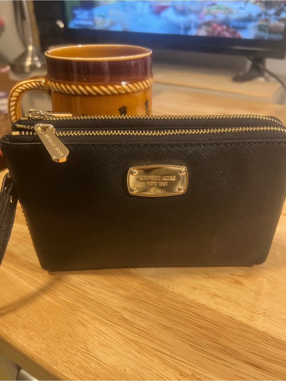 Michael Kors Black Wristlet with Gold Hardware